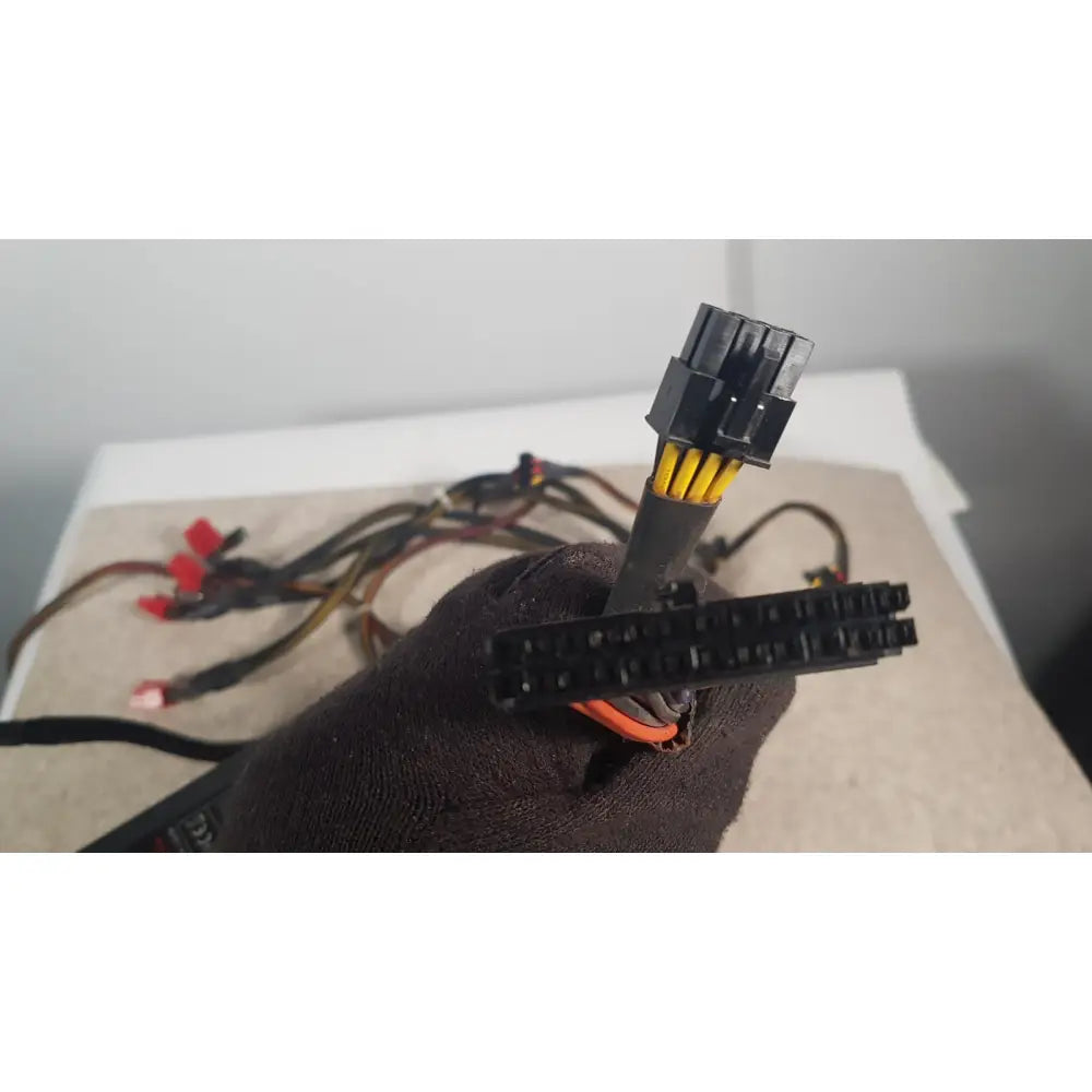 Black plastic power supply connector with yellow and orange wires of thermaltake 1350w toughpower gf3 1350w unit