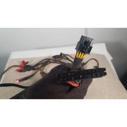 Black plastic power supply connector with yellow and orange wires of thermaltake 1350w toughpower gf3 1350w unit