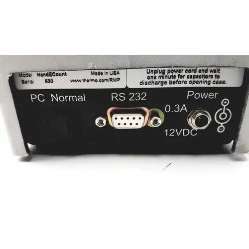 Black thermo electron handecount portable sample counter with silver db9 serial port and 12vdc power input options