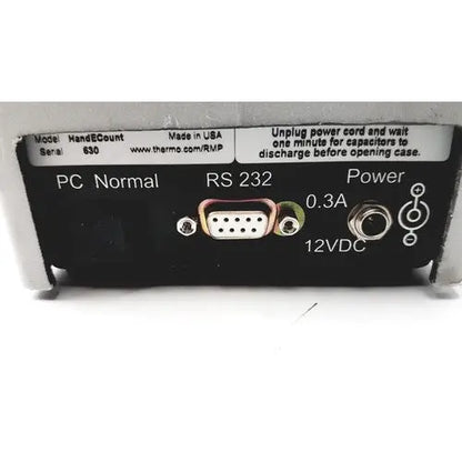 Black thermo electron handecount portable sample counter with silver db9 serial port and 12vdc power input options