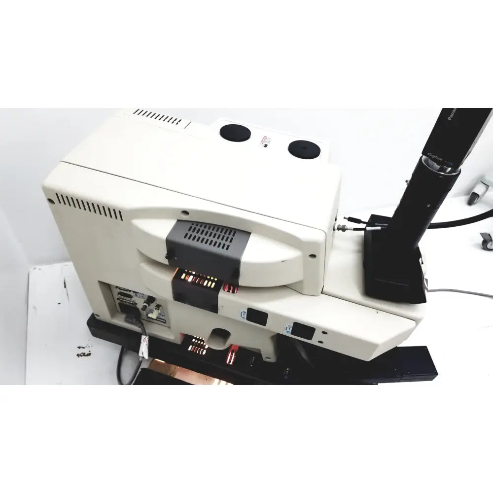 White and black thermo nicolet continuum infrared microscope with modern design ventilation slots and multiple base ports