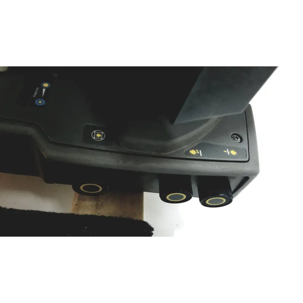Black robotic vacuum cleaner with three circular sensors and yellow indicator lights for thermo nicolet continuum infrared microscope use