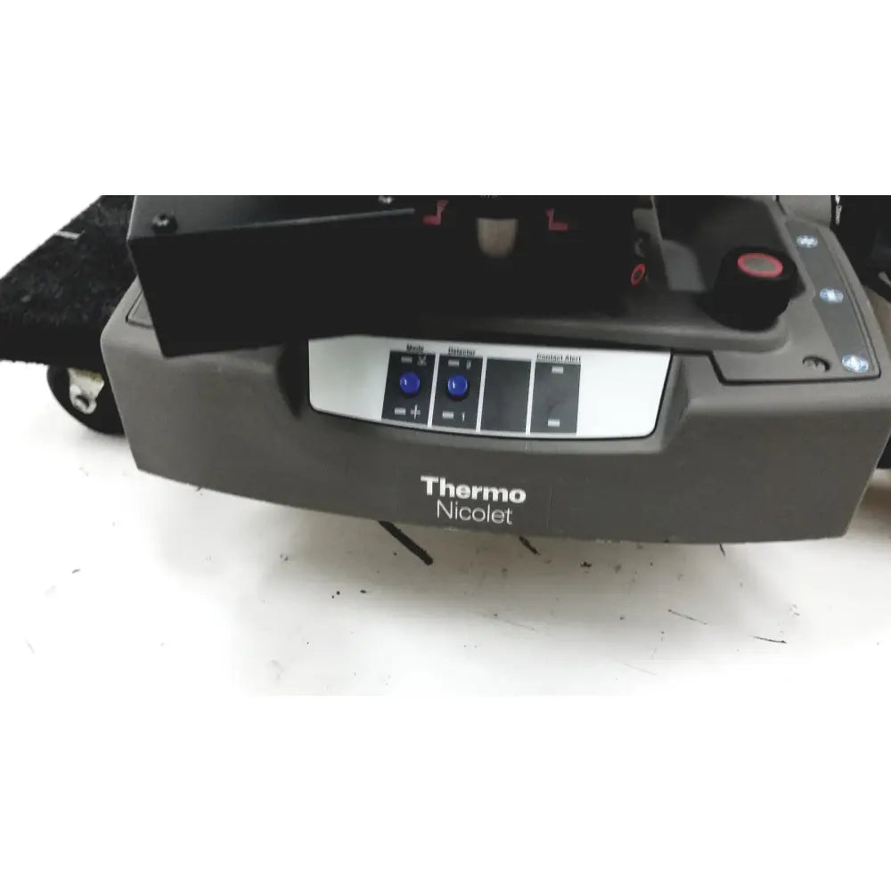 Gray thermo nicolet continuum infrared microscope featuring a control panel with blue buttons and labeled sections