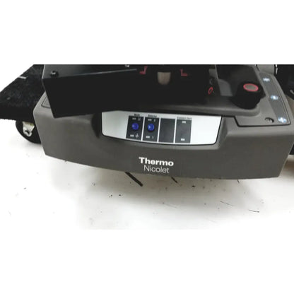 Gray thermo nicolet continuum infrared microscope featuring a control panel with blue buttons and labeled sections
