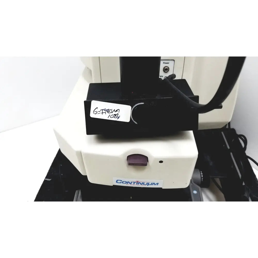 Thermo nicolet continuum infrared microscope with black and cream body featuring g-titan 1084 component on top