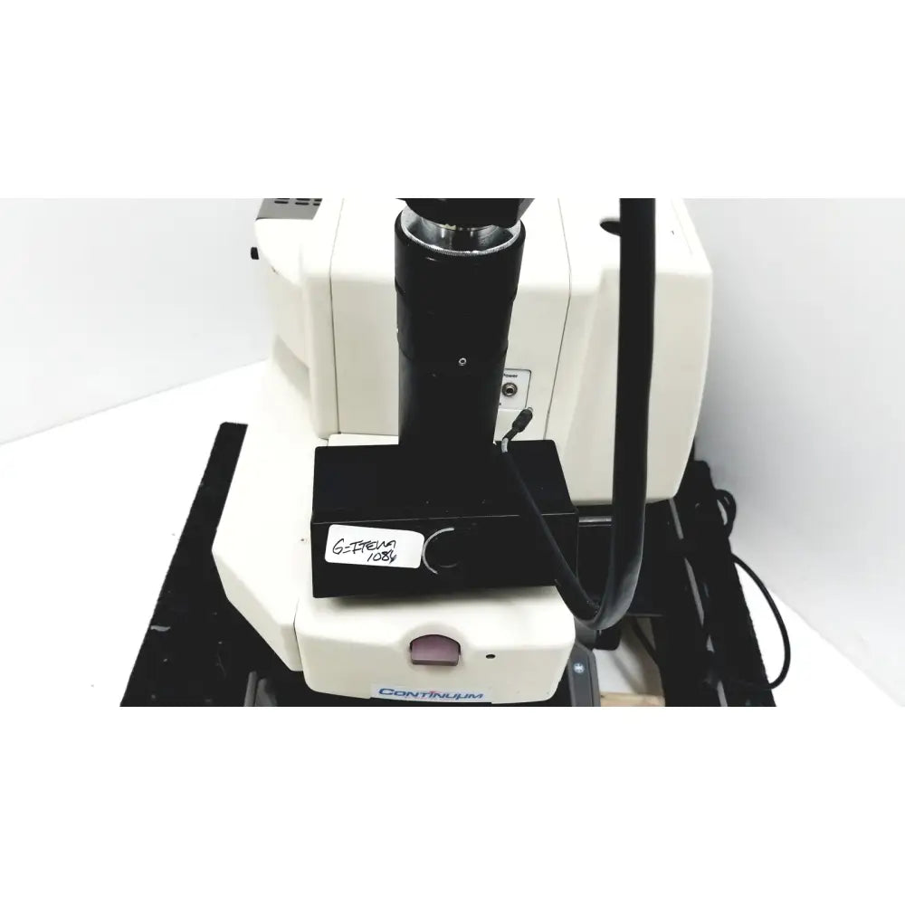 White and black thermo nicolet continuum infrared microscope with labeled stage plate for precise sample analysis