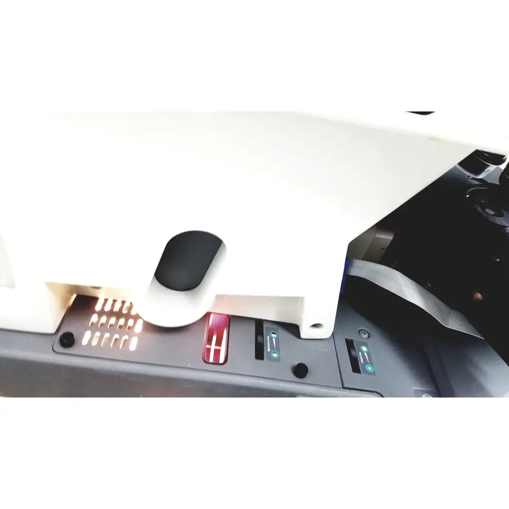 White plastic car charging station with black and red buttons for thermo nicolet continuum infrared microscope use