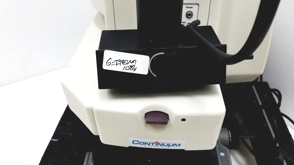 Thermo nicolet continuum infrared microscope with black and cream body featuring g-titan 1084 component on top