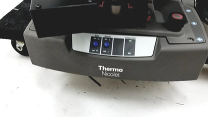 Gray thermo nicolet continuum infrared microscope featuring a control panel with blue buttons and labeled sections