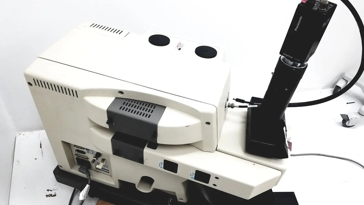 White and black panasonic thermo nicolet continuum infrared microscope with camera attachment for advanced imaging