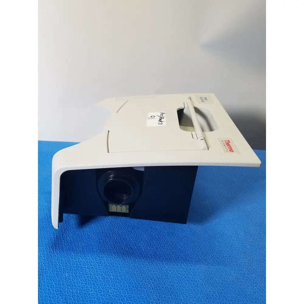 White and black thermo nicolet smart collector diffuse reflectance FTIR accessory with imatron handle and logo visible