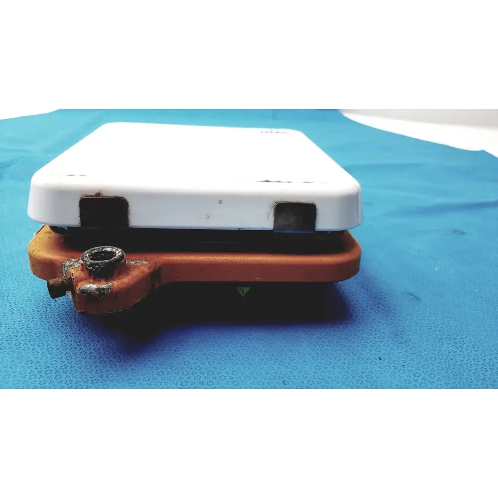 White plastic thermo scientific cimarec digital hot plate stirrer with rusted orange metal base for laboratory use