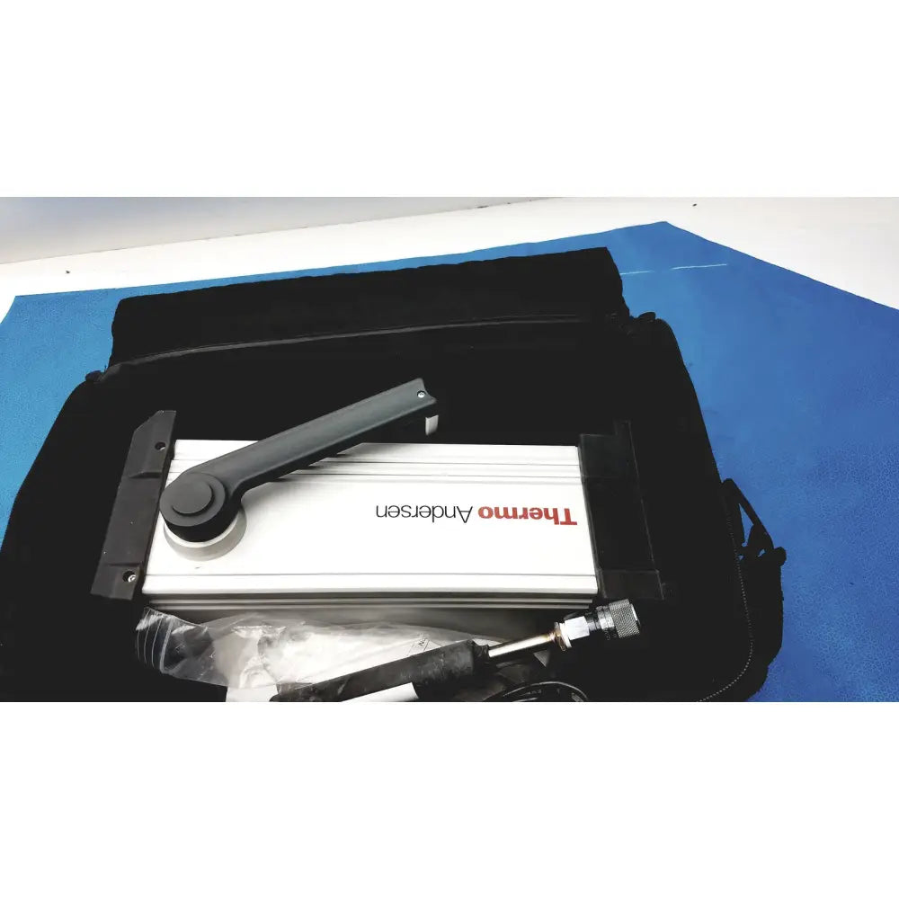 White and black therma anderssen door closer with sleek modern design featured on thermo scientific dataram4 monitor