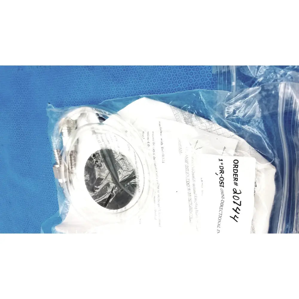 White medical-grade surgical mask in clear packaging with printed order info for thermo scientific dataram4 dr-4000 monitor
