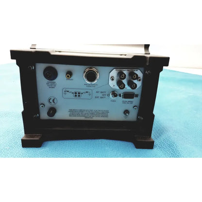 Black rugged industrial thermo scientific dataram4 portable particulate monitor with silver label showing ports and switches