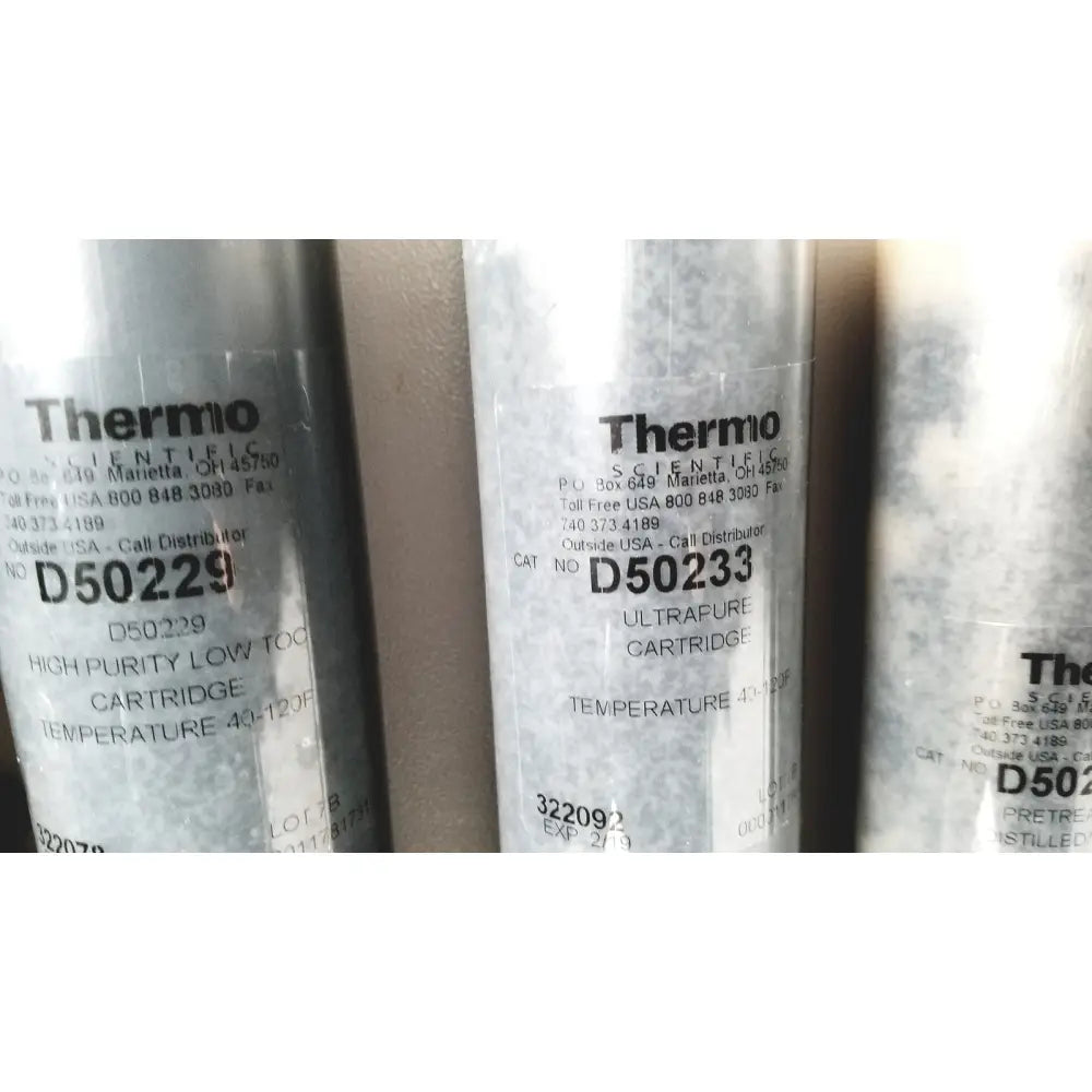 Silver cylindrical thermo scientific easypure ii d7401 ultrapure cartridge with black labeling for d7401 lab grade filtration
