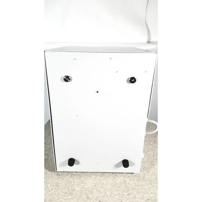 White thermo scientific easypure ii d7401 water filter system with black feet and circular knobs on the back side