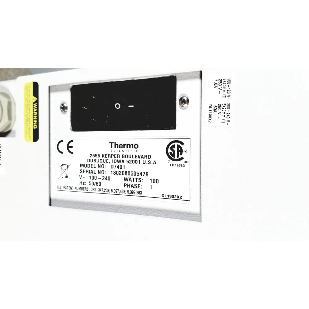 White rectangular label with black text showing model number d7401 and serial number on thermo scientific easypure ii d7401 lab grade system