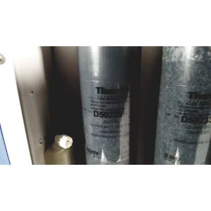 Gray cylindrical Thermo Scientific D5029 high-purity low temperature cartridge for Easypure II D7401 lab grade filter system