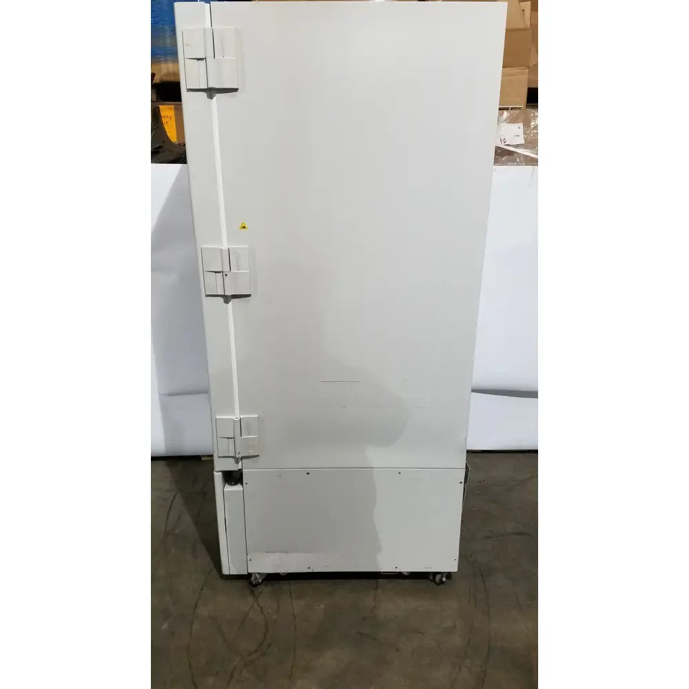 White industrial-grade thermo scientific forma ultra-low temperature freezer with three heavy-duty latches and casters