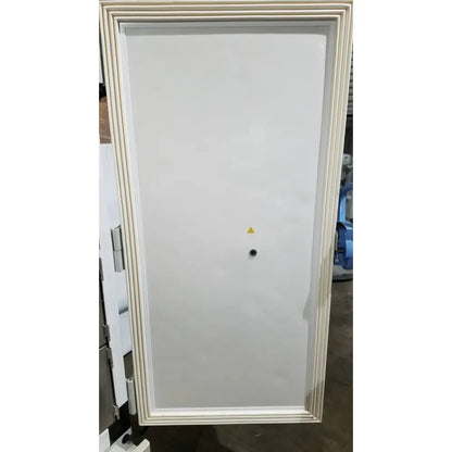 White industrial-grade electrical panel with cream beveled frame and warning symbol on thermo scientific forma freezer
