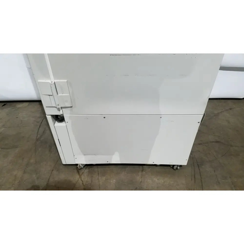 White industrial-grade thermo scientific forma 88000 series ultra-low temperature freezer with sturdy rectangular design and side hinges