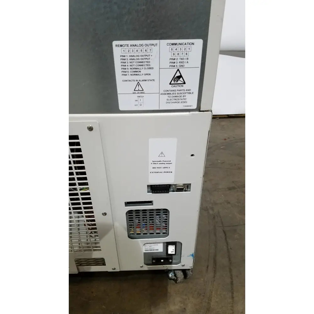 White thermo scientific forma ultra-low temperature freezer control panel with labeled ports and warning stickers