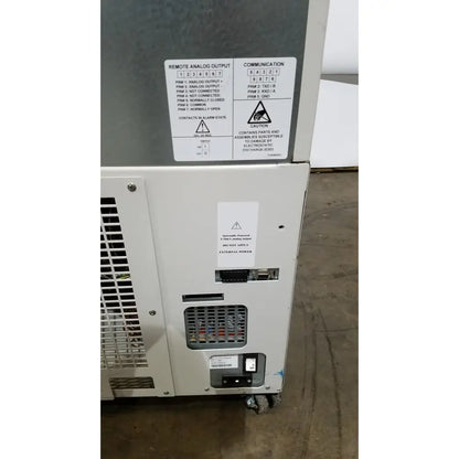 White thermo scientific forma ultra-low temperature freezer control panel with labeled ports and warning stickers