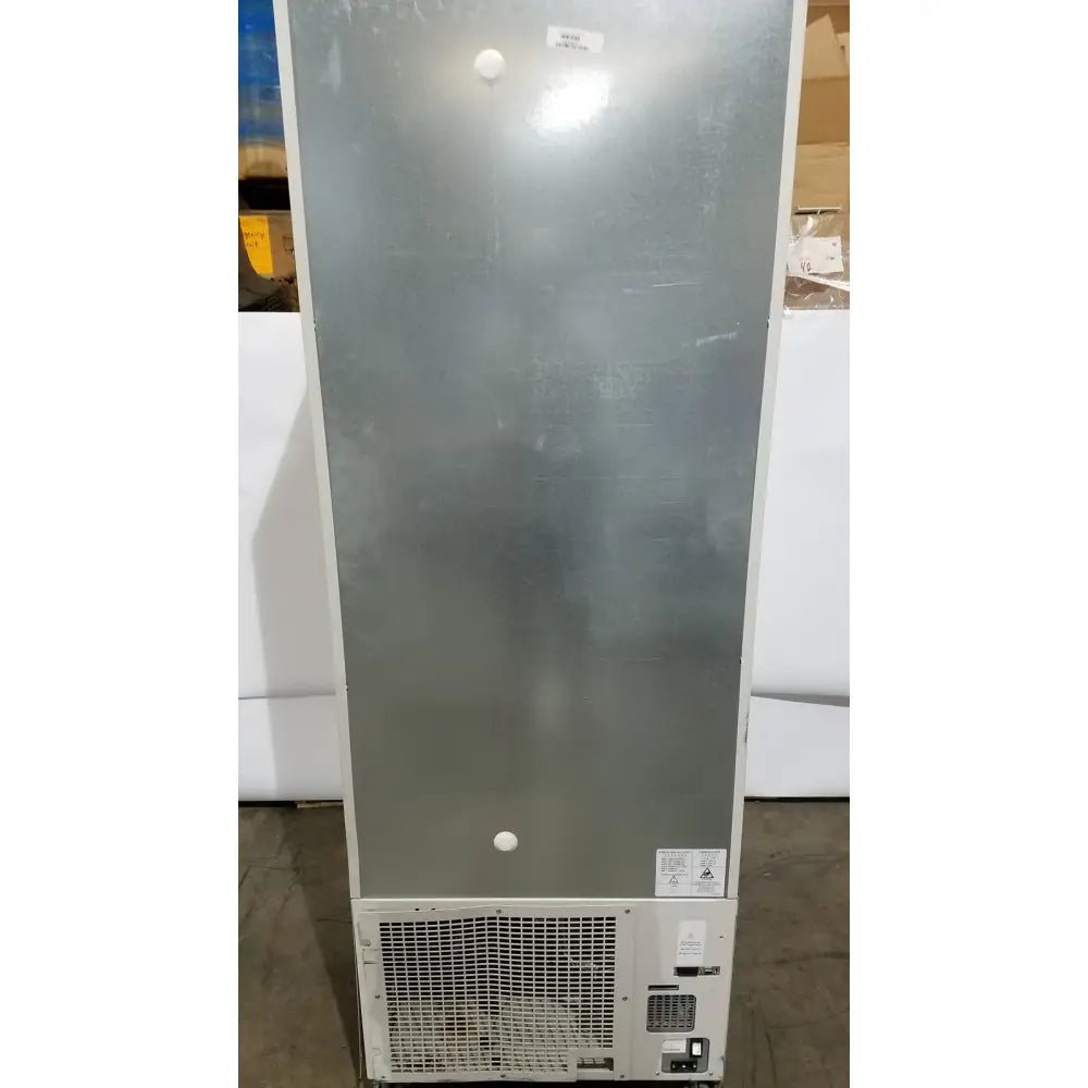 Silver stainless steel thermo scientific forma upright freezer with white trim and vented grille at the base