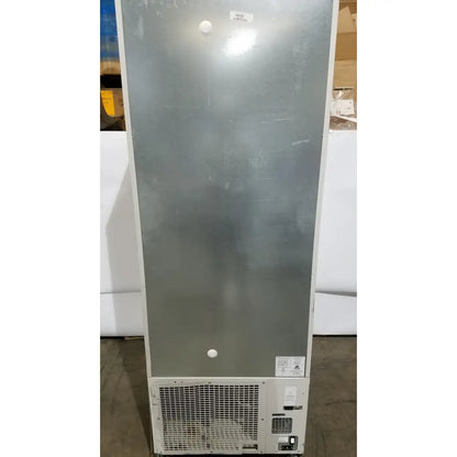 Silver stainless steel thermo scientific forma upright freezer with white trim and vented grille at the base