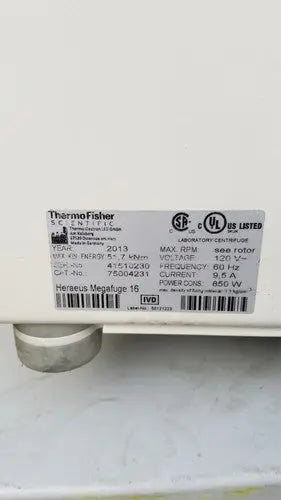 White rectangular label with black text and logos on the back of a thermo scientific heraeus megafuge 16 laboratory centrifuge