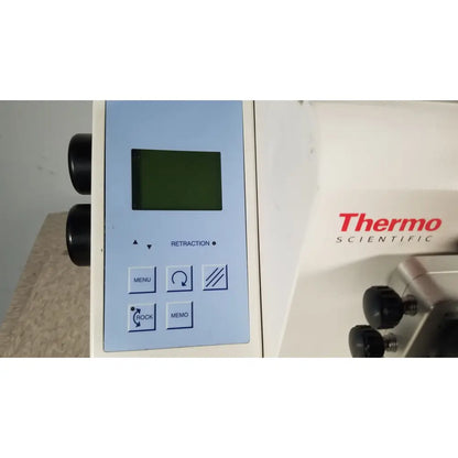 White thermo scientific microm hm 340e laboratory instrument with light blue control panel and green display screen