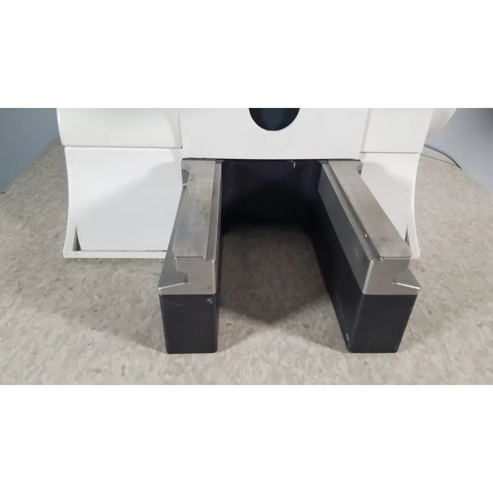 White and black industrial machine base with metallic side rails of thermo scientific microm hm 340e serial no 45258