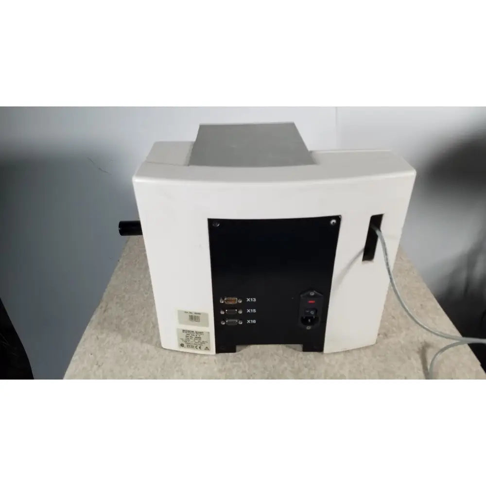 White desktop printer with black panel showing labeled ports and power switch back view of thermo scientific microm hm 340e