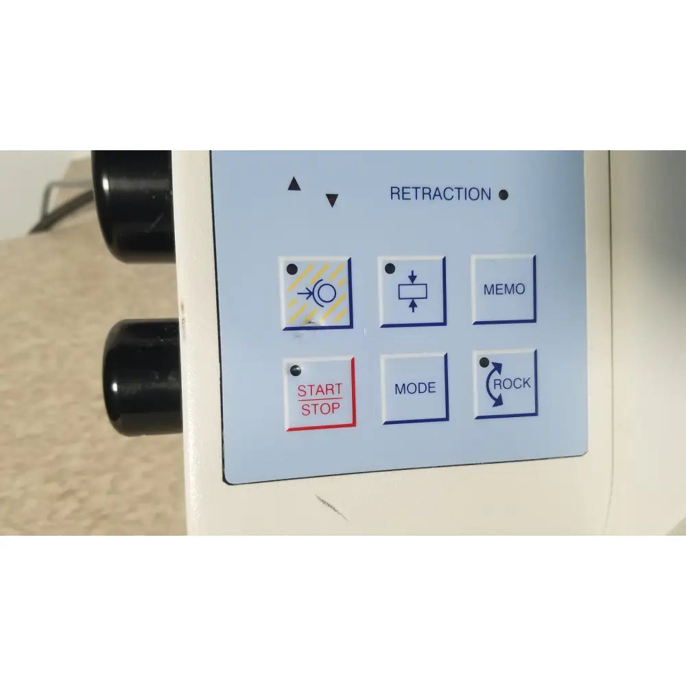 The control panel of the white thermo scientific microm hm 355 s rotary microtome features six labeled buttons with icons