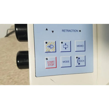 The control panel of the white thermo scientific microm hm 355 s rotary microtome features six labeled buttons with icons