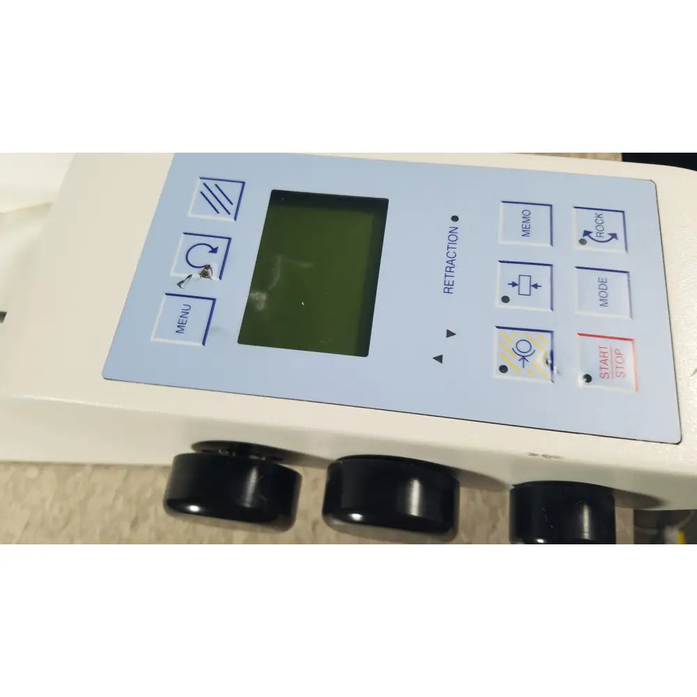 Light blue control panel with black buttons and green screen on thermo scientific microm hm 355 s rotary microtome