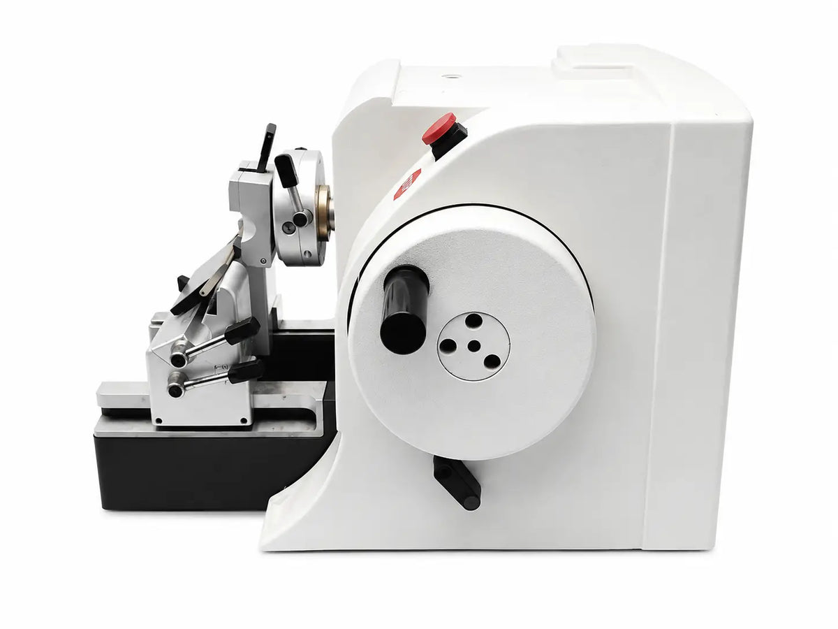 White thermo scientific microm hm 355s rotary microtome with metallic components and red emergency stop button