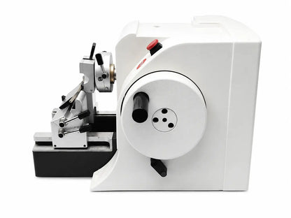 White thermo scientific microm hm 355s rotary microtome with metallic components and red emergency stop button