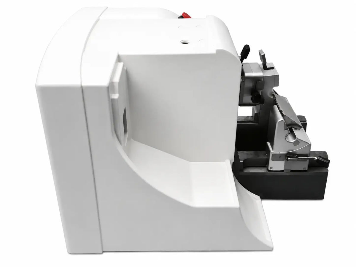 Thermo scientific microm hm 355s rotary microtome with white plastic and metal key cutting machine featuring red power button