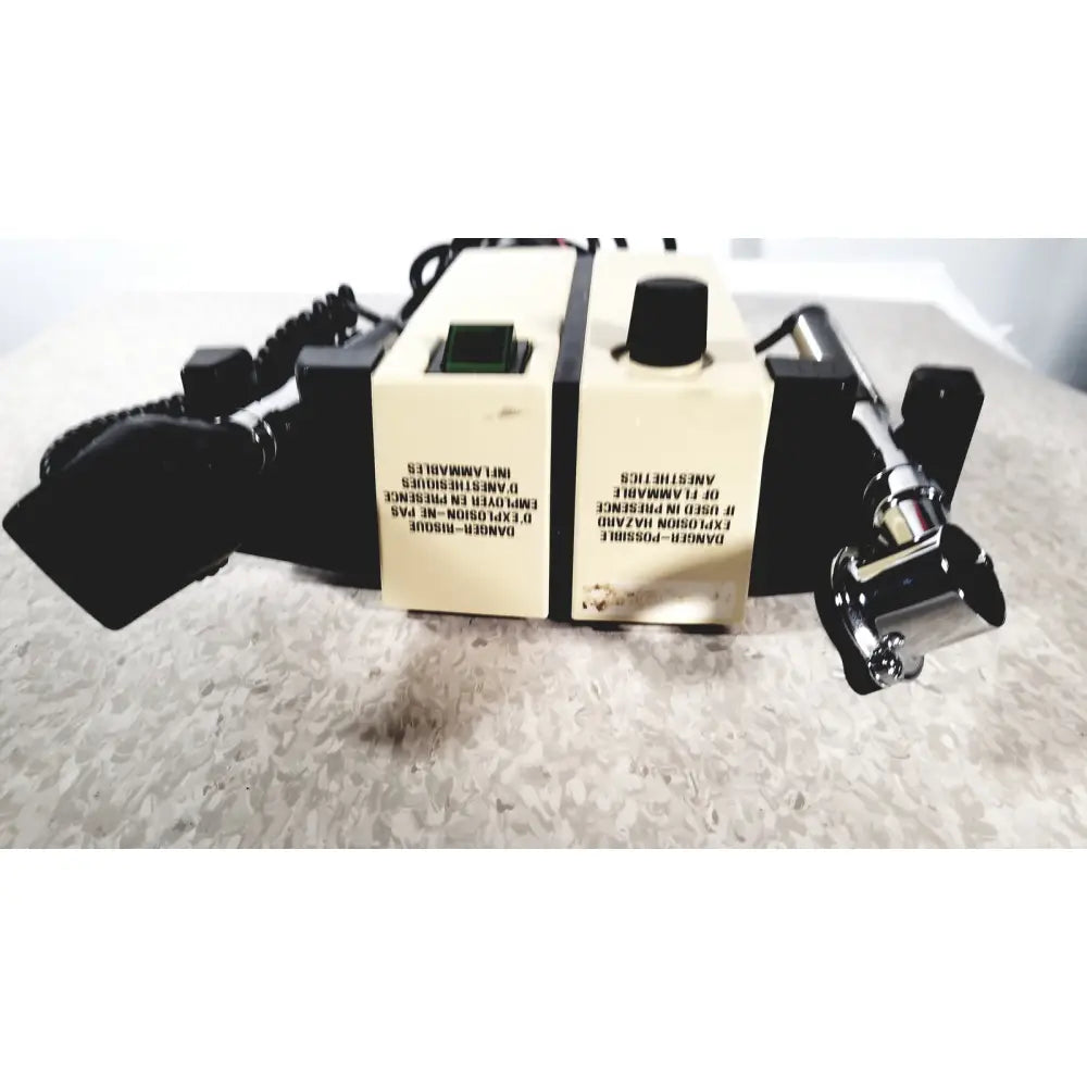 Beige and black thermo scientific slidemate anesthesia machine with warning labels for laboratory printer use