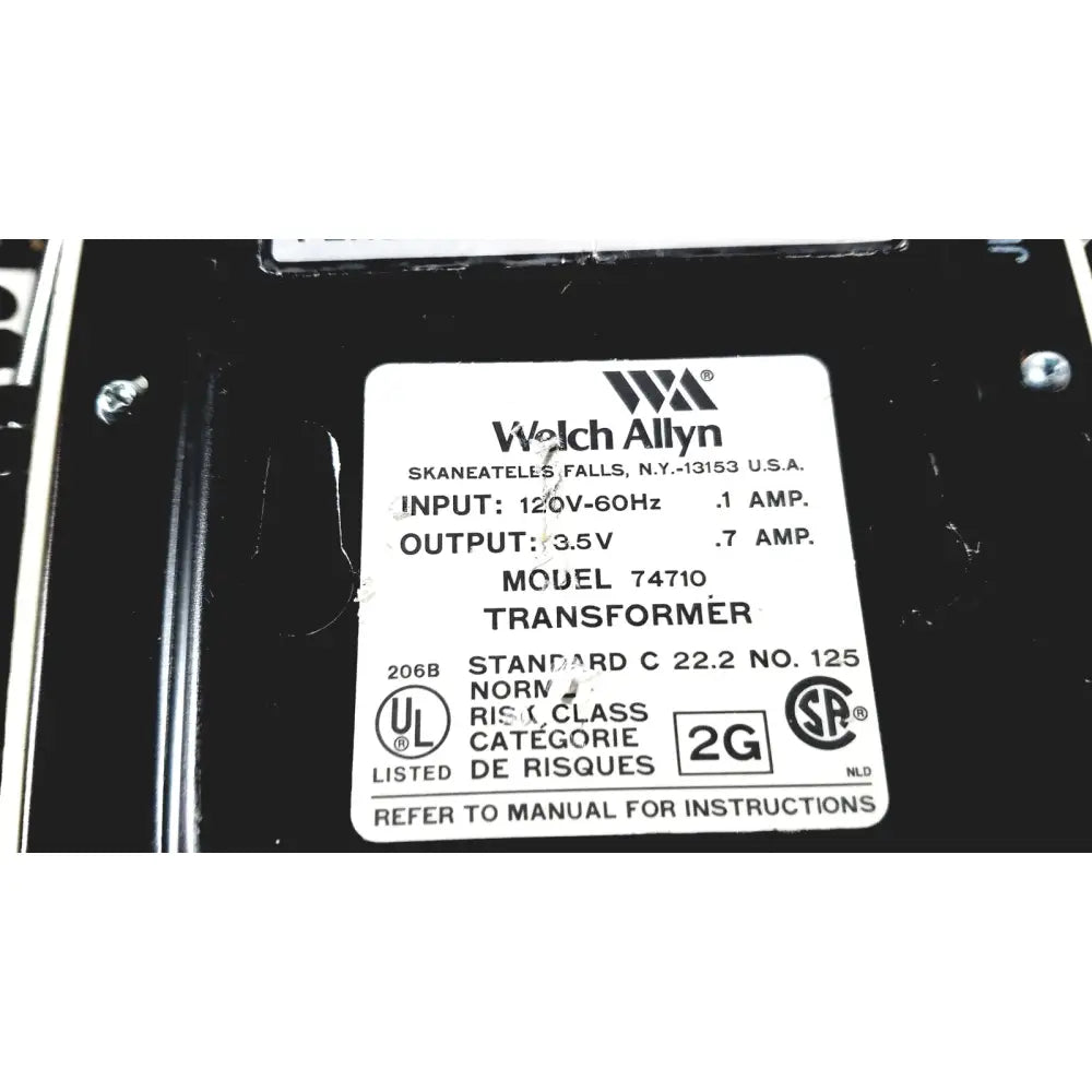 Black welch allyn model 74710 transformer with electrical specs label on the back of thermo scientific slidemate printer laboratory device
