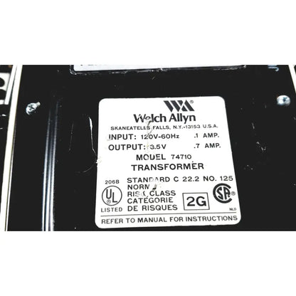 Black welch allyn model 74710 transformer with electrical specs label on the back of thermo scientific slidemate printer laboratory device