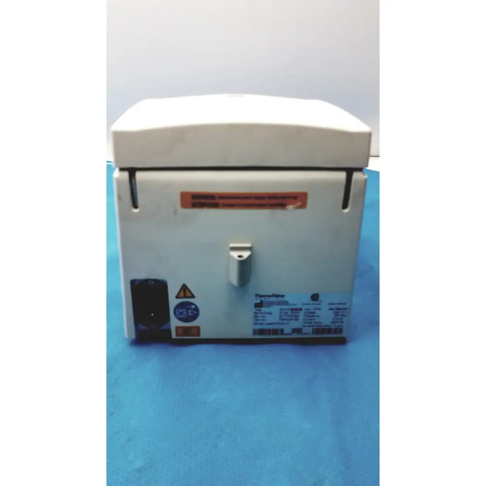 White plastic laboratory centrifuge with hinged lid and control panel thermo scientific sorvall legend micro 21