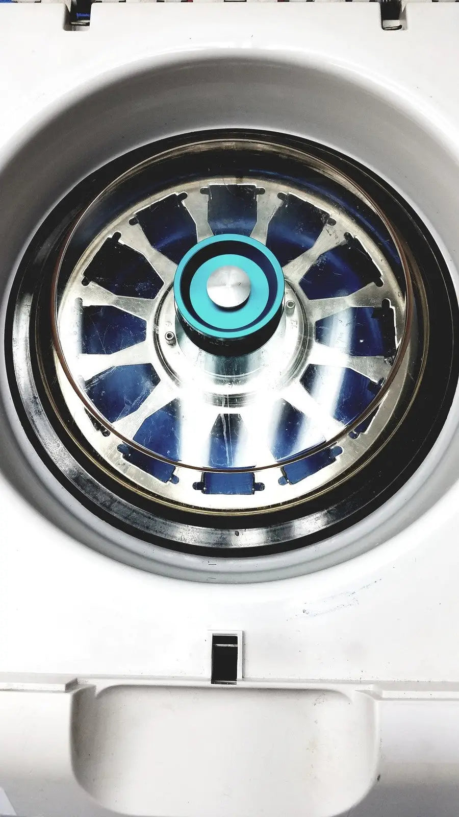 White thermo shandon cytospin 4 centrifuge with metallic rotor featuring blue and silver components for reuse medical applications