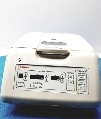 White thermo shandon cytospin 4 centrifuge with rotor and control panel featuring labeled buttons and digital displays