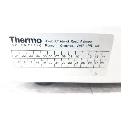 White rectangular label with black text and numbered grid on thermo shandon cytospin control a78300101 centrifuge