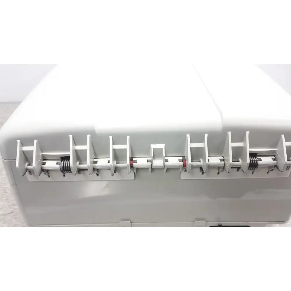 White plastic thermo shandon cytospin 4 control a78300101 centrifuge featuring red and white spring-loaded latches