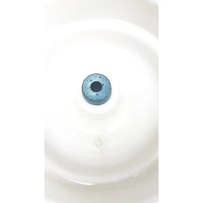 A blue ceramic circular component with a central hole for thermo shandon cytospin control a78300101 centrifuge use