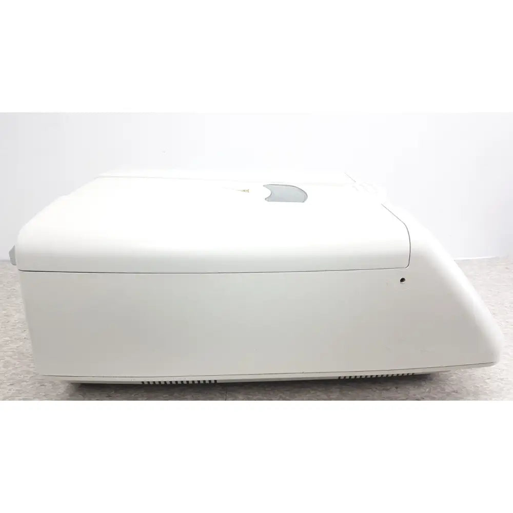 White plastic apple imac desktop with minimalist design alongside thermo shandon cytospin control a78300101 centrifuge